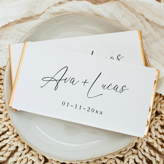 Chocolate bar with a customized white wrapper that has the name of a couple andt their wedding date